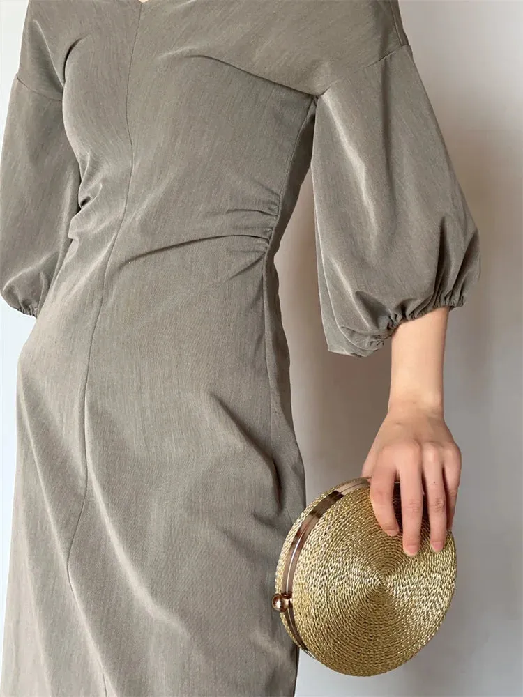 Hena Hand-Woven Round Rattan Bag