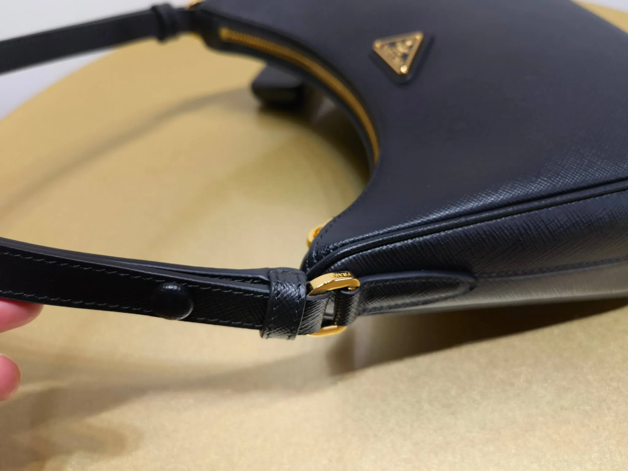 PRA Re-Edition Saffiano Leather mini Axillary pouch bag Black 1BC204