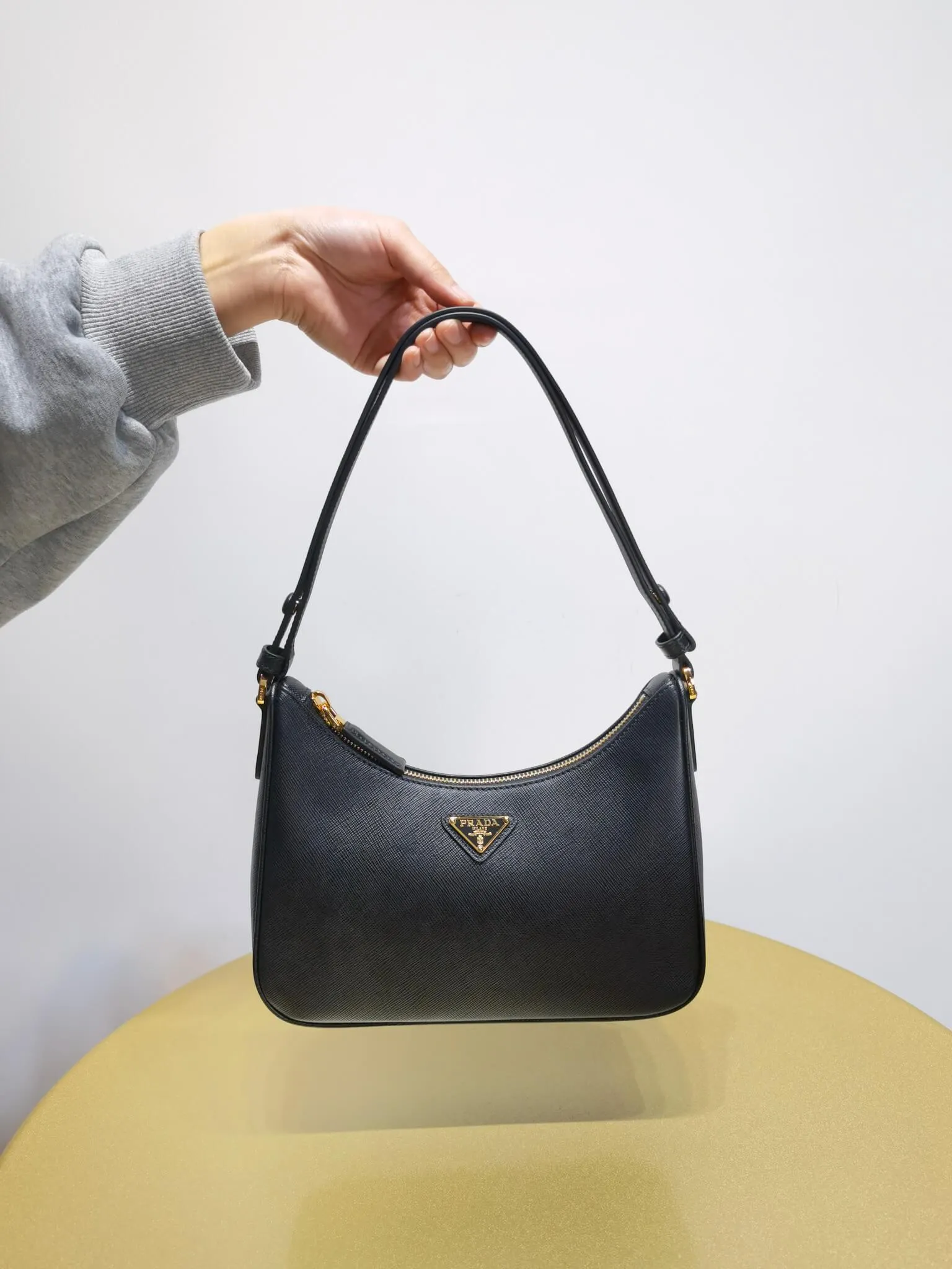 PRA Re-Edition Saffiano Leather mini Axillary pouch bag Black 1BC204