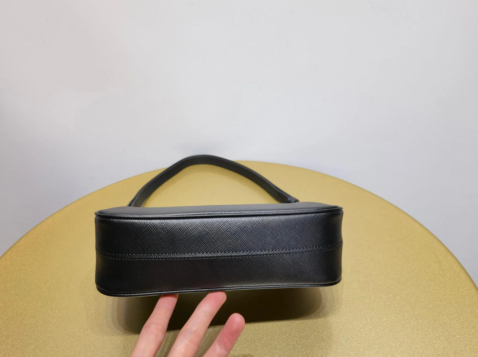 PRA Re-Edition Saffiano Leather mini Axillary pouch bag Black 1BC204