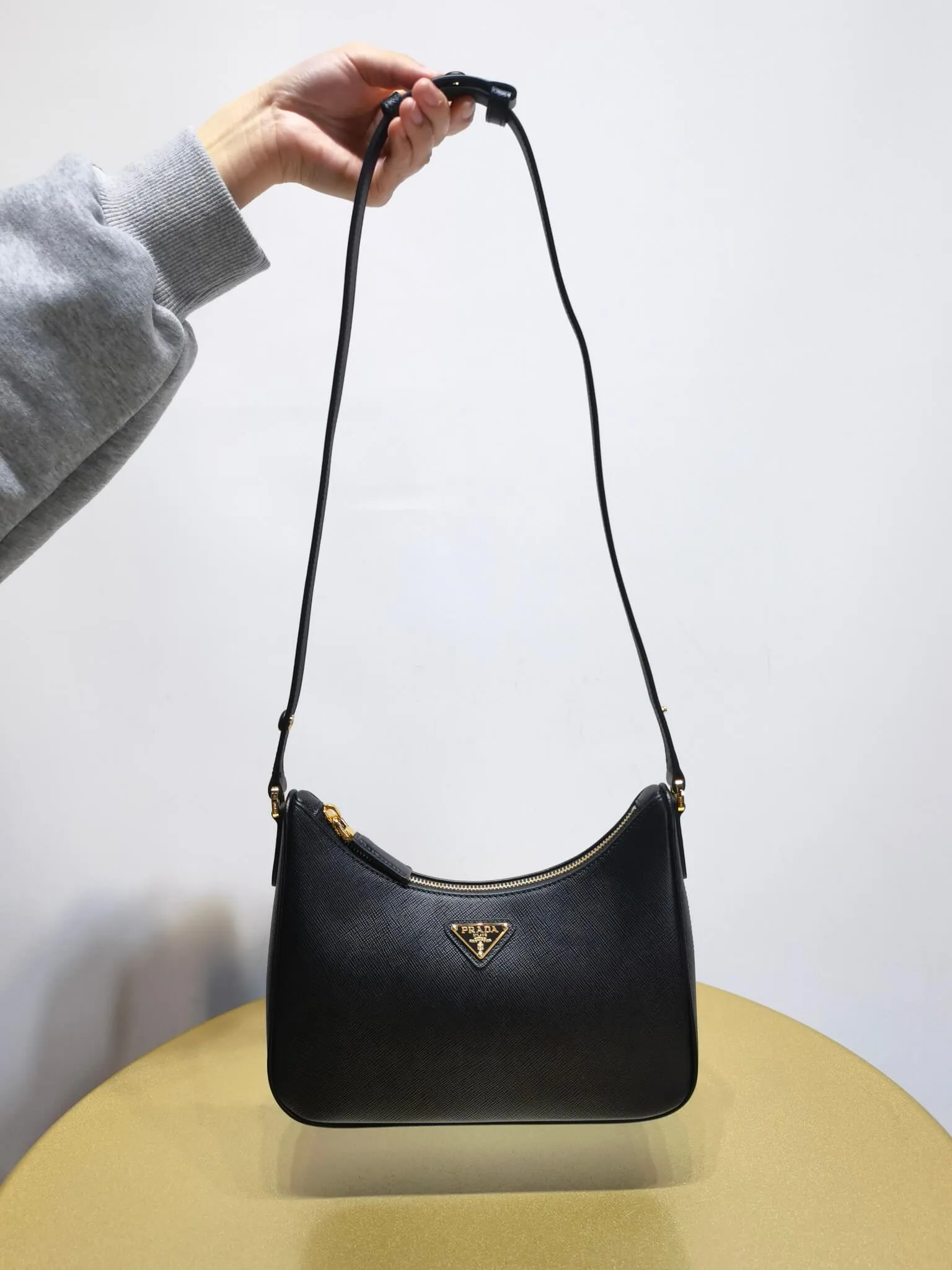 PRA Re-Edition Saffiano Leather mini Axillary pouch bag Black 1BC204