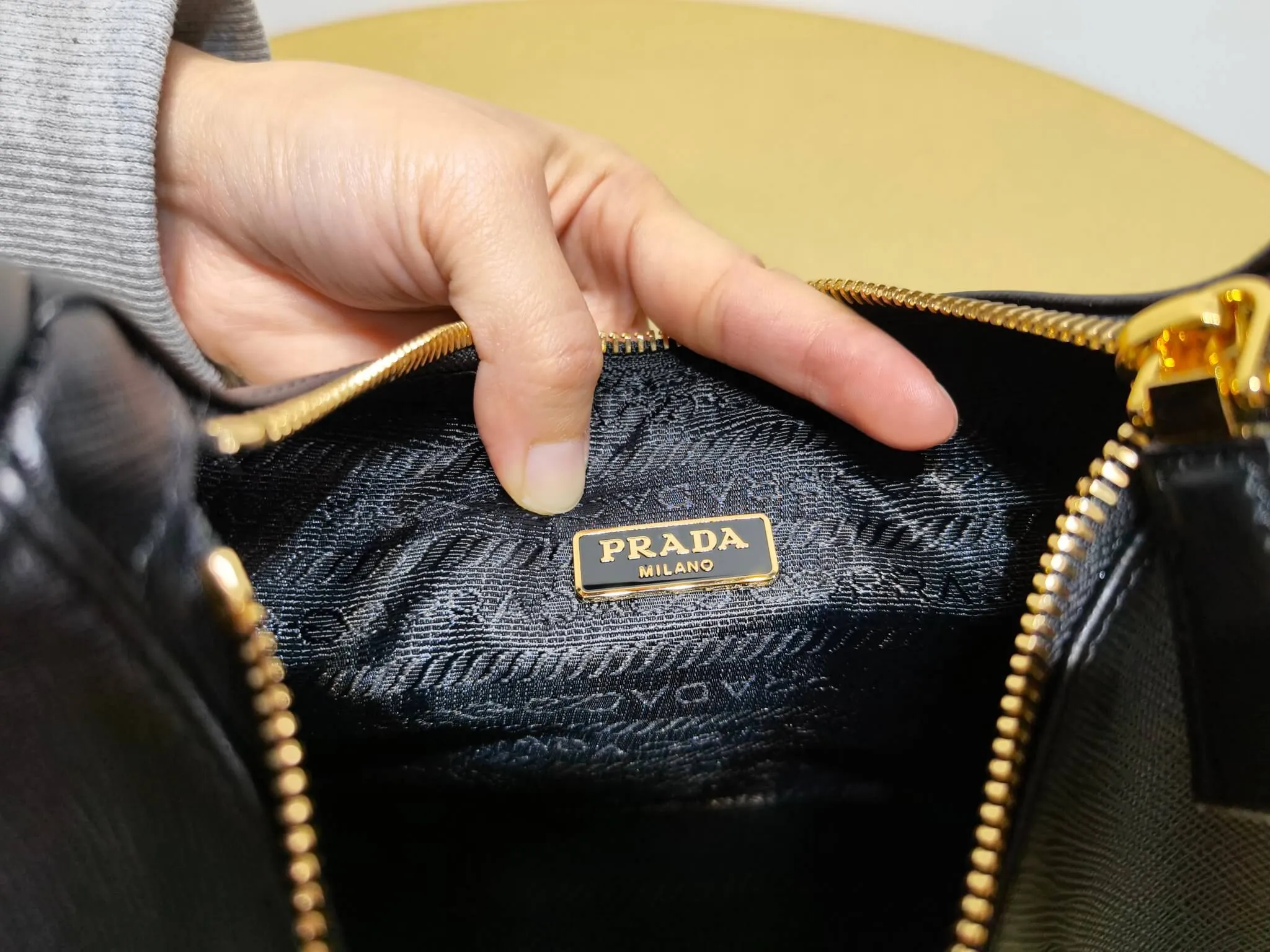 PRA Re-Edition Saffiano Leather mini Axillary pouch bag Black 1BC204