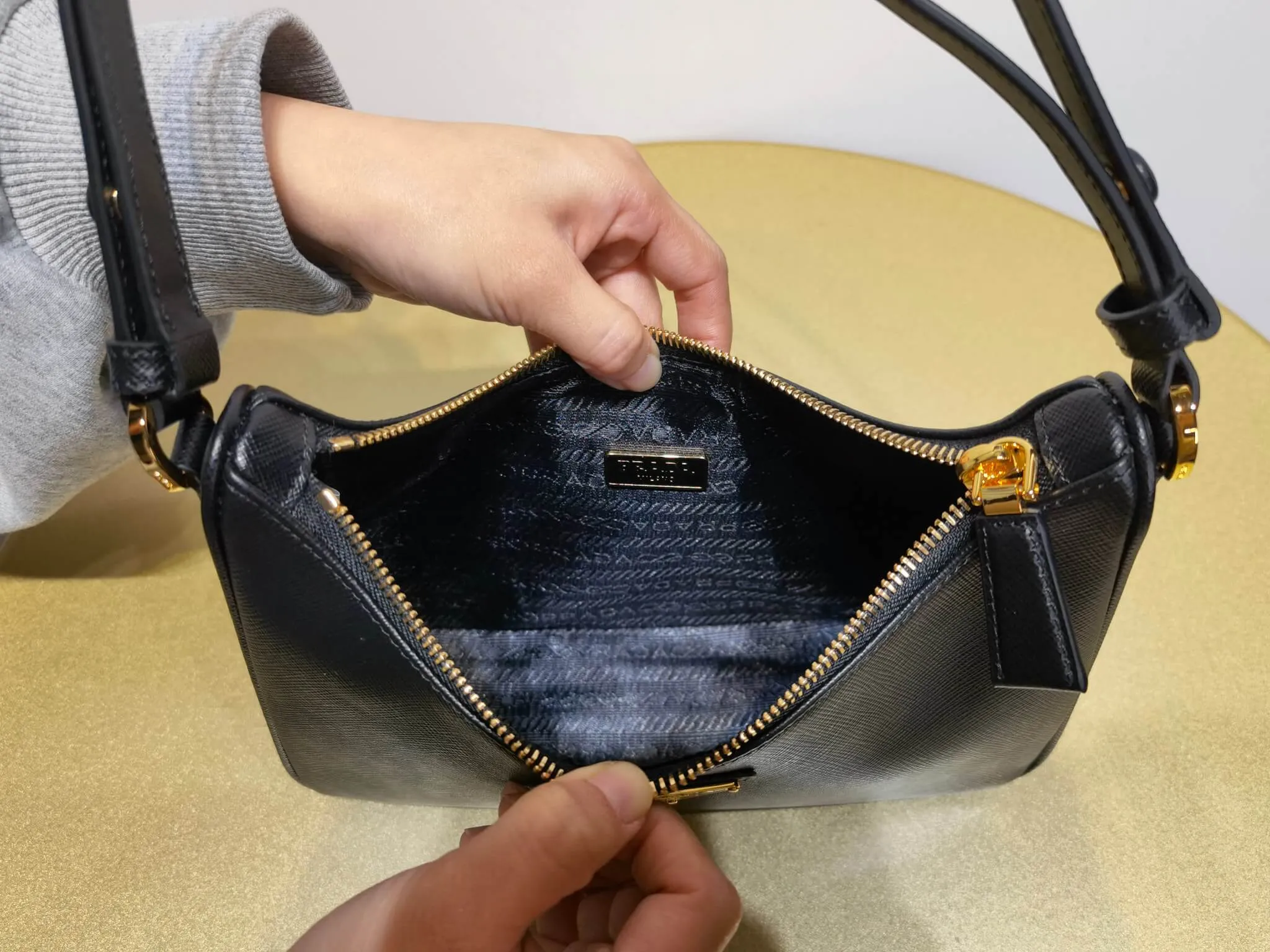 PRA Re-Edition Saffiano Leather mini Axillary pouch bag Black 1BC204
